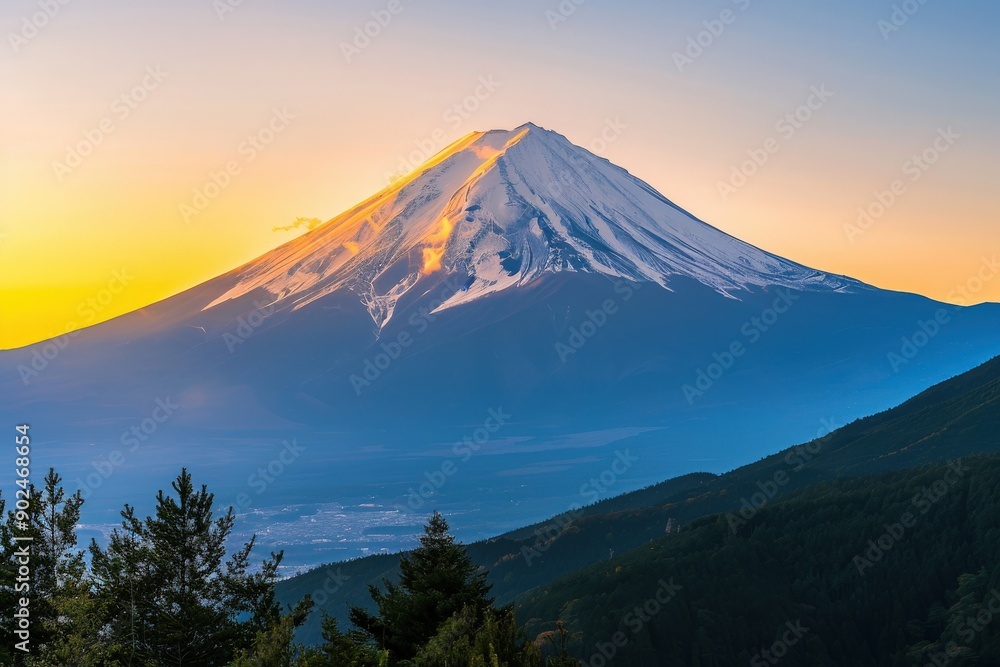 Breathtaking view of a snow-capped mountain at sunrise, surrounded by lush forests and misty valleys. Breathtaking view of a snow-capped mountain at sunrise, surrounded by lush forests and misty valleys.