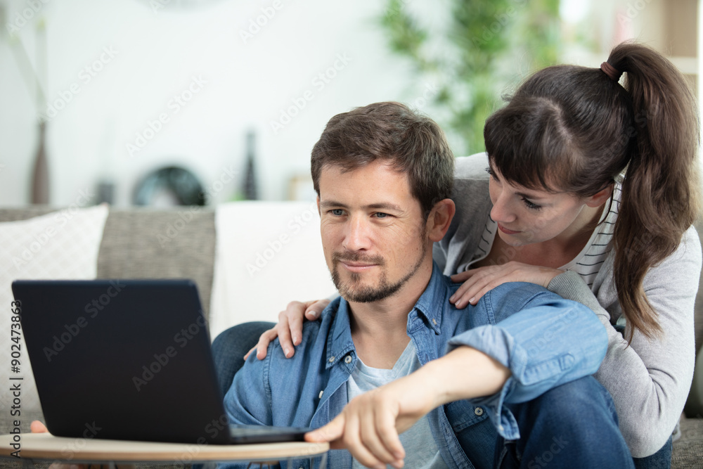 happy couple reading mail and checking accountancy happy couple reading mail and checking accountancy