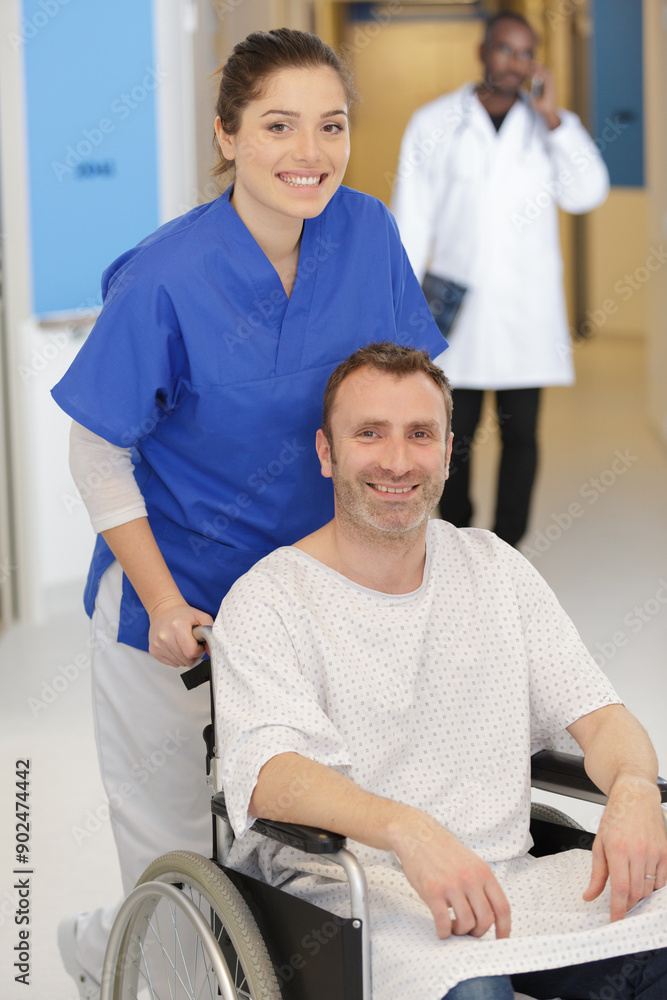 nurse taking care of patient in wheelchair nurse taking care of patient in wheelchair