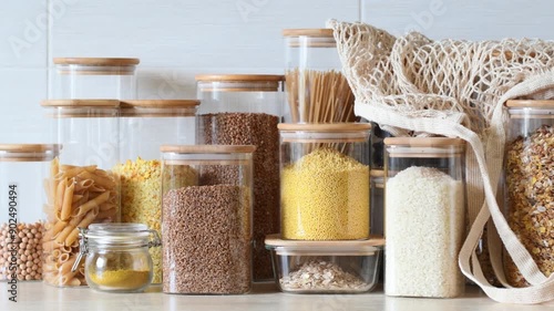 Modern kitchen, eco-friendly dishes, glass jars for storing food. Zero waste and sustainable development concept.