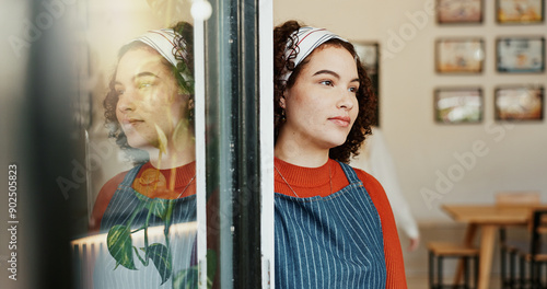 Thinking, waiting and woman at coffee shop entrance for opening with vision of hospitality future. Cafe, door and retail with idea of restaurant owner or waitress at store for planning or service