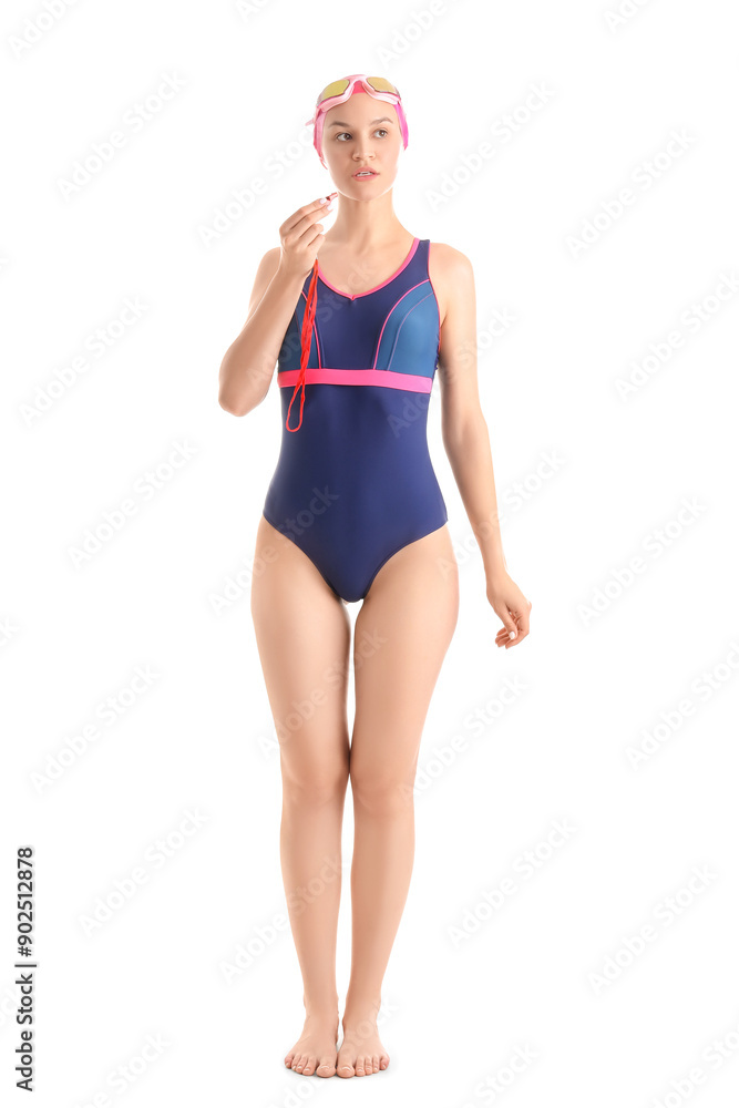 Professional young female swimmer with whistle on white background Professional young female swimmer with whistle on white background