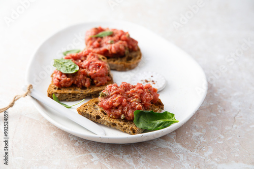 Traditional steak tartare on toast