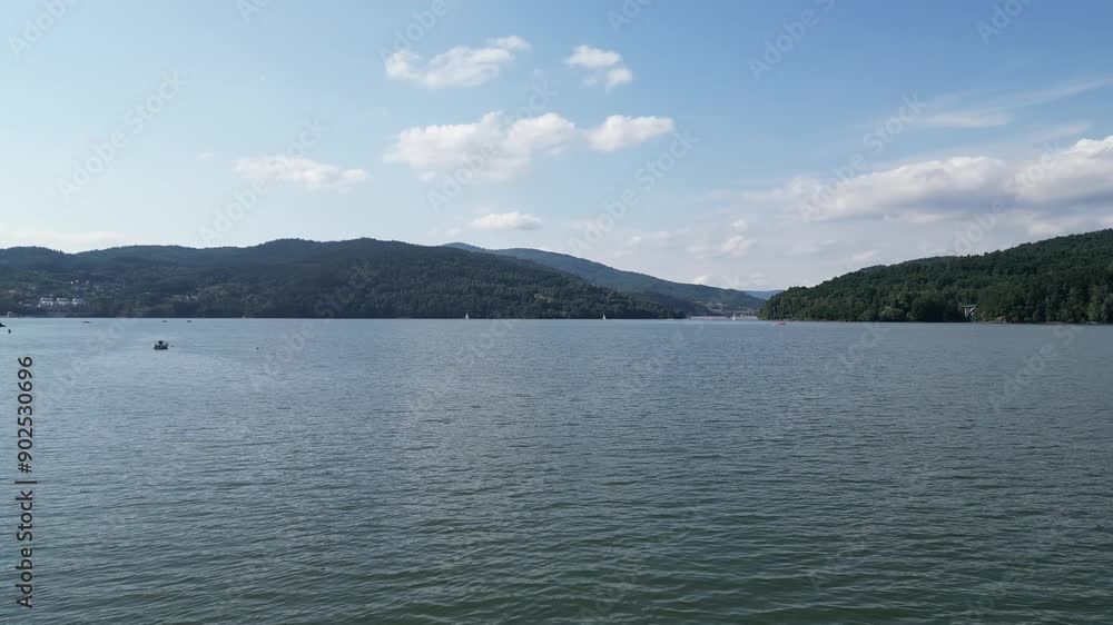 Landscape of majestic Zywiec lake in Beskid mountains during a beautiful summer day - aerial view 4K Landscape of majestic Zywiec lake in Beskid mountains during a beautiful summer day - aerial view 4K