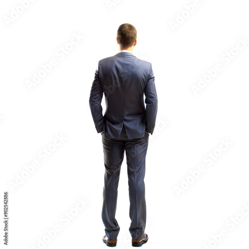 Rear view of businessman in suit standing against white background, emphasizing formal attire and professional demeanor