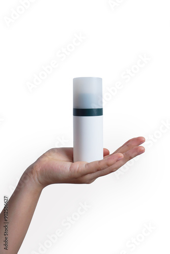 Female hand holding skin care product, Cosmetic white blank bottle cream Hand cream concept . Packaging for cream, gel, serum, advertising and product promotion, mockup