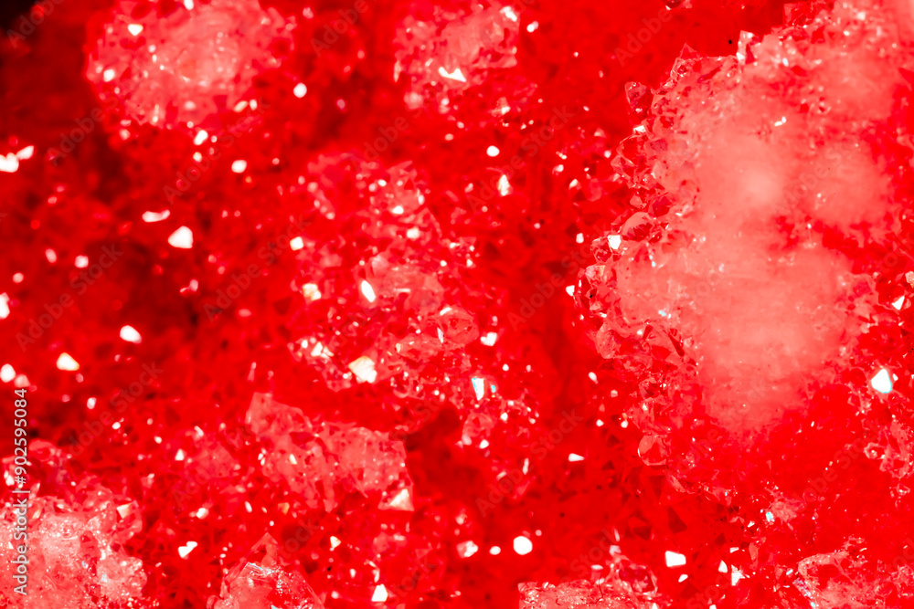 Amethyst red crystals. Gems. Mineral crystals in the natural environment. Texture of precious and semiprecious stones. Seamless background with copy space colored shiny surface of precious stones. Amethyst red crystals. Gems. Mineral crystals in the natural environment. Texture of precious and semiprecious stones. Seamless background with copy space colored shiny surface of precious stones.