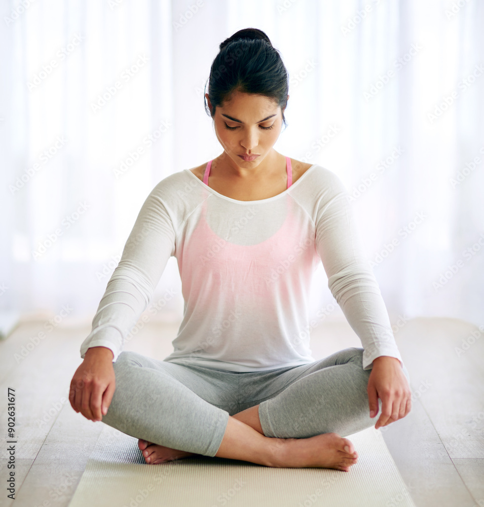 Woman, yoga and relax meditating in home, zen and chakra for wellness in apartment on mat. Holistic, mindfulness and inner peace with eyes closed with yogi, awareness and tranquility in house Woman, yoga and relax meditating in home, zen and chakra for wellness in apartment on mat. Holistic, mindfulness and inner peace with eyes closed with yogi, awareness and tranquility in house