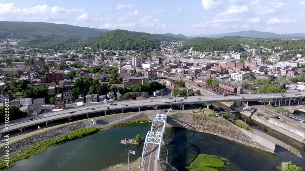 Downtown Cumberland, Maryland with freeway traffic with drone video moving left to right. Downtown Cumberland, Maryland with freeway traffic with drone video moving left to right.