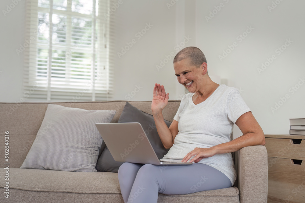 Elderly Woman Expressing Emotions During Video Call on Laptop in Modern Home Setting Elderly Woman Expressing Emotions During Video Call on Laptop in Modern Home Setting