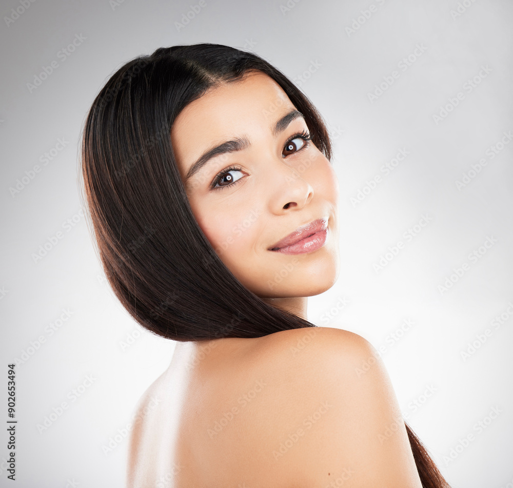 Portrait, hair care and woman with shine, wellness or cosmetics on gray studio background. Face, person or model with texture, volume or beauty with glow, dermatology or grooming routine for growth Portrait, hair care and woman with shine, wellness or cosmetics on gray studio background. Face, person or model with texture, volume or beauty with glow, dermatology or grooming routine for growth