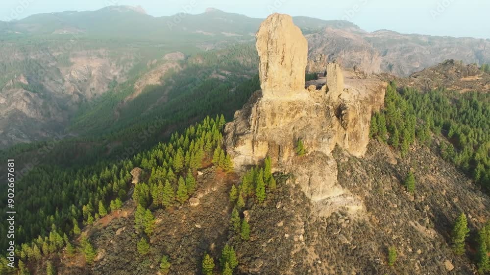 Wonderful aerial view in orbit during the sunset of Roque Nublo on the island of Gran Canaria with beautiful colors, Spain. Wonderful aerial view in orbit during the sunset of Roque Nublo on the island of Gran Canaria with beautiful colors, Spain.
