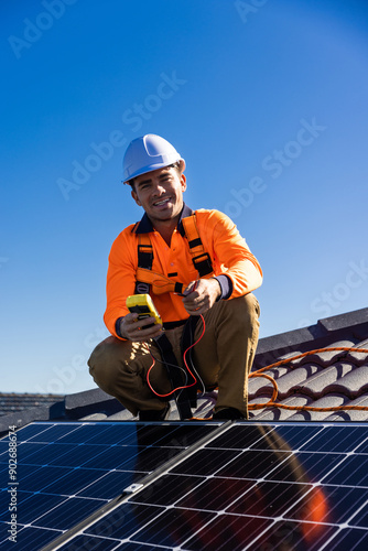 Solar panel technician with power meter and solar panels