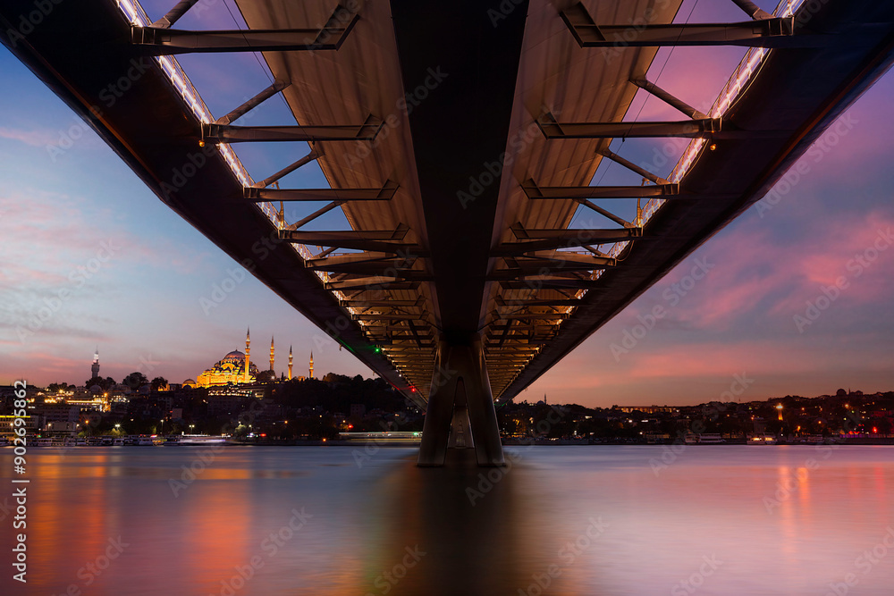 Istanbul metro station on the modern bridge on Golden Horn at sunset time. Istanbul metro station on the modern bridge on Golden Horn at sunset time.