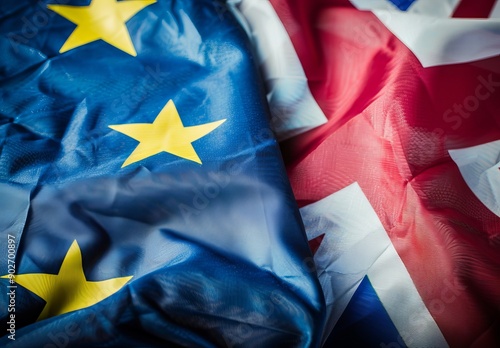 A close-up of the British and European flags, symbolizing simplified extraterritoriality. The European Union blue field with yellow stars is on one half of the picture,  photo