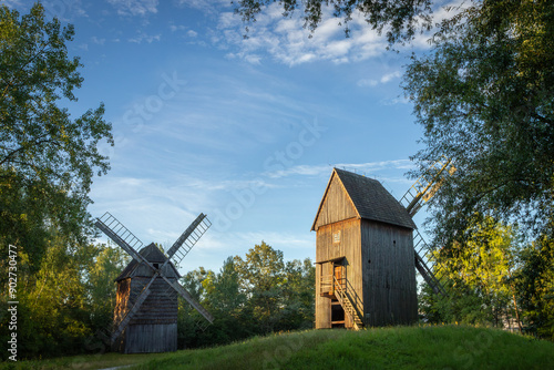 Old wooden windmills in the morning sun