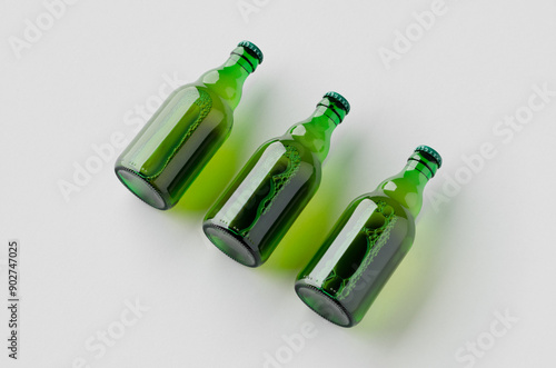 Green steinie beer bottle mockup on a grey background. photo