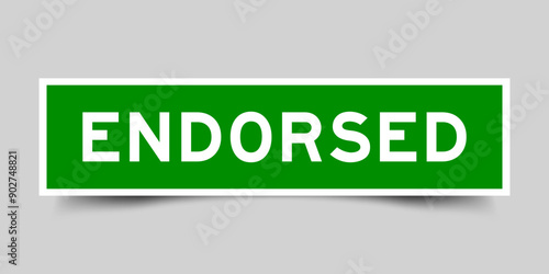 Green color square label sticker with word endorsed that inserted in gray background