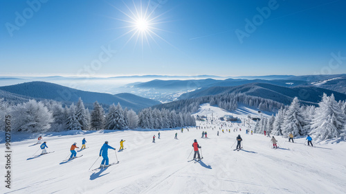 People enjoying skiing and snowboarding in mountain ski resort with beautiful winter landscape in the background 