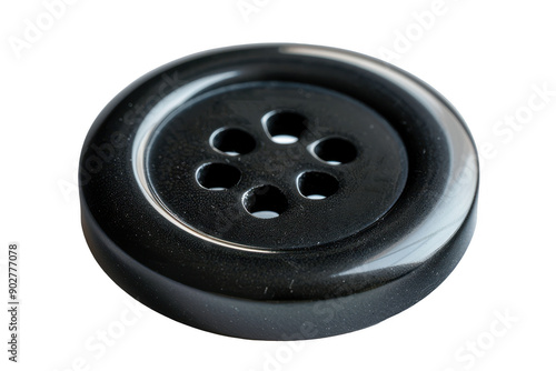 High Resolution Close-Up of a Large Black Button with Five Holes