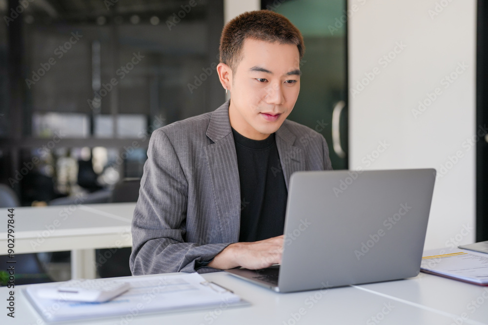 Business man working using laptop computer Hands typing keyboard. Professional investor working start up project. business planning in office. Technology business Business man working using laptop computer Hands typing keyboard. Professional investor working start up project. business planning in office. Technology business