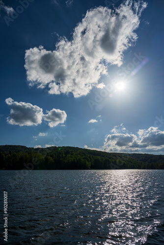 Sunset at Vlasina Lake. Vlasina lake scenery with beautiful clouds in the blue sky. Beautiful semi-artificial lake in Southeast Serbia.
 photo