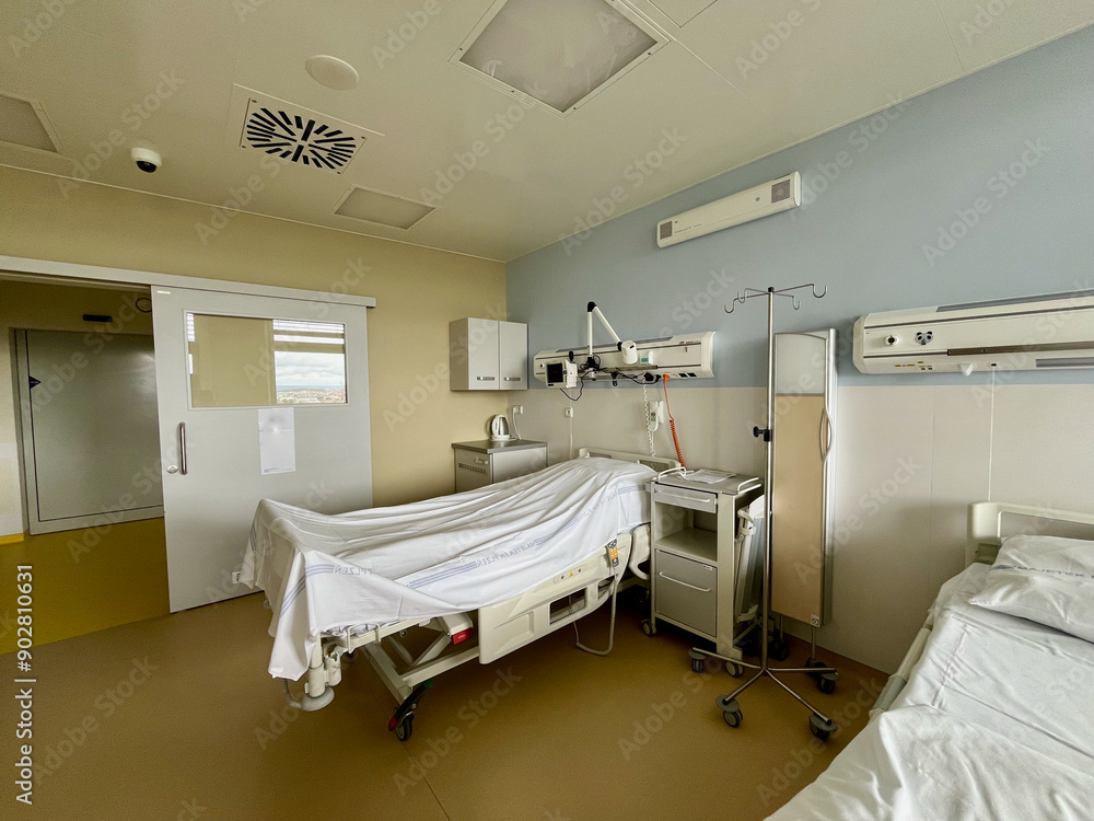 Big becovery Room with bed and comfortable medical equipped in a hospital. Mattress with white cloth