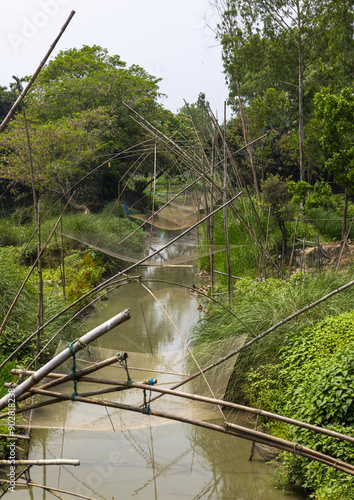 Fishing nets on a river, Dhaka Division, Delduar, Bangladesh photo