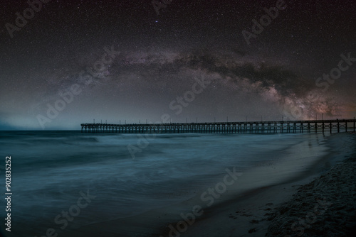 Full Milky Way Arch over an ocean pier