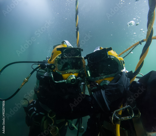 Commercial diver prepared for deep water entry