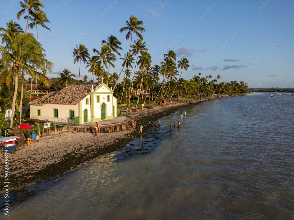 Obraz premium Aerial photo of São Benedito Church at Praia dos Carneiros in the city of Tamandaré, state of Pernambuco, Brazil