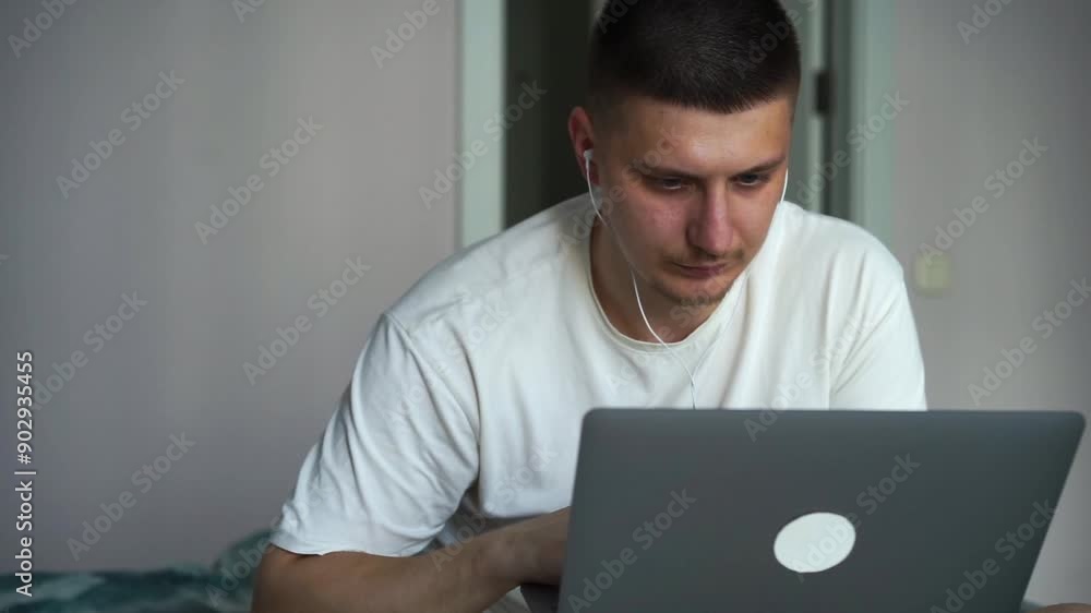 college student using laptop computer watching distance learning seminar, remote university webinar or conducting virtual class meeting, studying online on university campus. college student using laptop computer watching distance learning seminar, remote university webinar or conducting virtual class meeting, studying online on university campus.