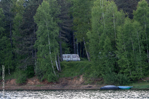 Camping in the mountains.  Abandoned camping trailers in the forest on Lake Vlasina.