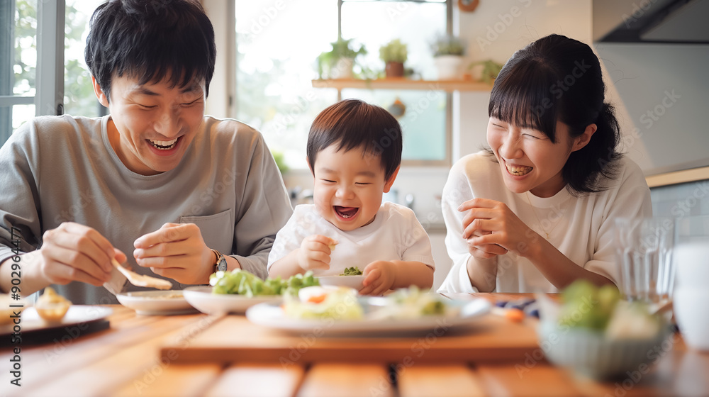 Happy family enjoys a meal together, sharing laughter and bonding moments in their cozy kitchen. Happy family enjoys a meal together, sharing laughter and bonding moments in their cozy kitchen.