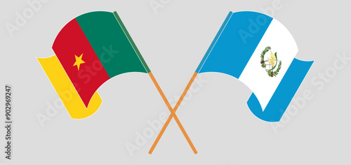 Crossed and waving flags of Cameroon and Republic of Guatemala