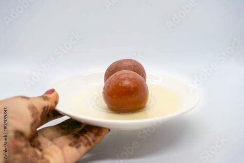 A Plate of Gulab Jamun Lal Mohan Sweets for Indian Ceremony Festival Diwali photo