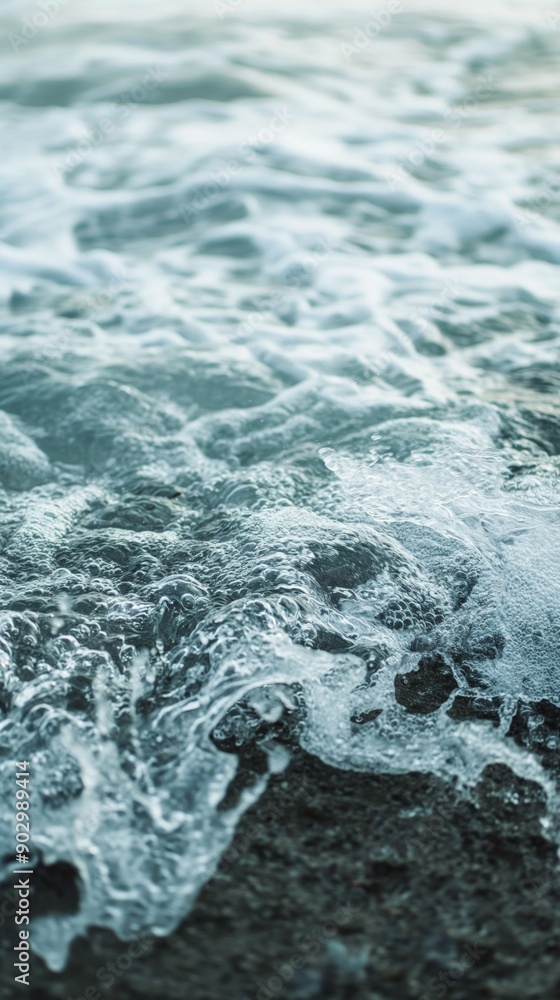Ocean waves gentle lapping shore soft diffused light peaceful day vertical Ocean waves gentle lapping shore soft diffused light peaceful day vertical