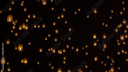 Thai people release sky floating lanterns or lamp to worship Buddha's relics at night. Traditional festival in Chiang mai, Thailand. Loy krathong