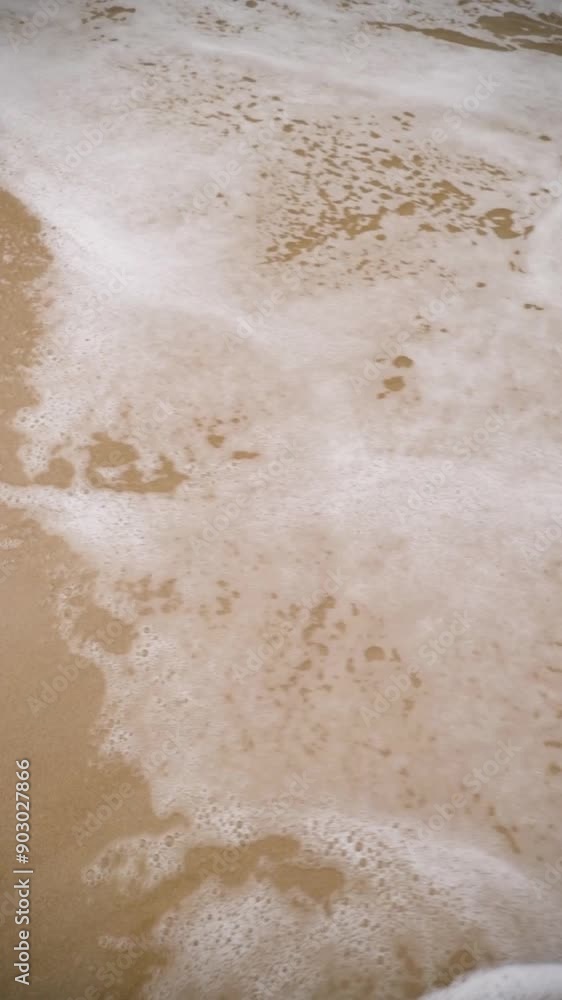 Slow motion vertical video 1080 of ocean foam with soothing sea sounds. Landscape concept. Slow motion vertical video 1080 of ocean foam with soothing sea sounds. Landscape concept.
