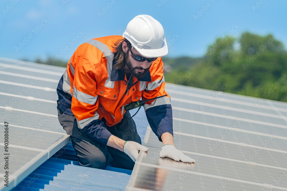 Worker Technicians are working to construct solar panels system on roof. Installing solar photovoltaic panel system. Men technicians walking on roof structure to check photovoltaic solar modules. Worker Technicians are working to construct solar panels system on roof. Installing solar photovoltaic panel system. Men technicians walking on roof structure to check photovoltaic solar modules.