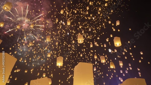 Thai people release sky floating lanterns or lamp to worship Buddha's relics at night. Traditional festival in Chiang mai, Thailand. Loy krathong