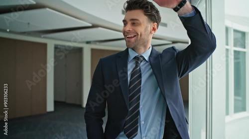 Wallpaper Mural Confident businessman walking office in elegant suit closeup. Friendly male  Torontodigital.ca