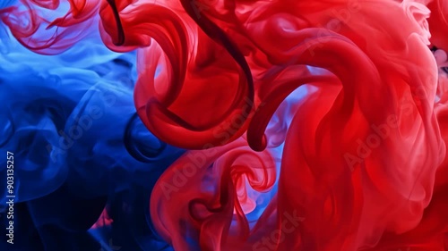 Red and blue ink swirling underwater, abstract
