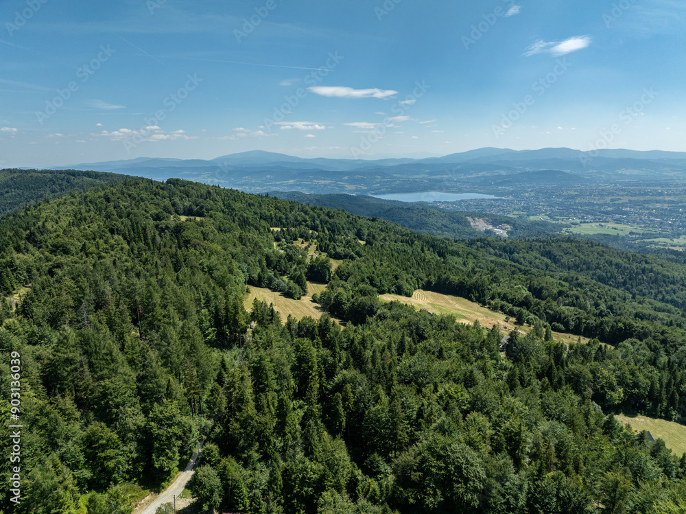 Stunning Aerial Drone View of Summer Green Forests in the Beskid Mountains, Bielsko Biala, Magurka Wilkowicka, Hills landscape Capturing the Beauty and Serenity of Lush Greenery and Rolling Hills Stunning Aerial Drone View of Summer Green Forests in the Beskid Mountains, Bielsko Biala, Magurka Wilkowicka, Hills landscape Capturing the Beauty and Serenity of Lush Greenery and Rolling Hills
