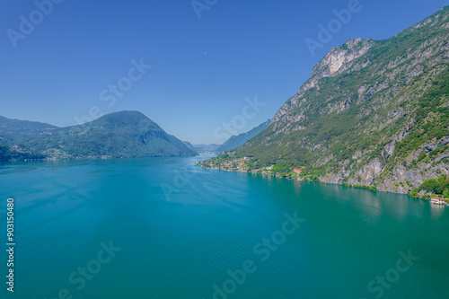 Aereal view of Lugano lake among mountains between Switzerland and Italy, beautiful panoramic landscape