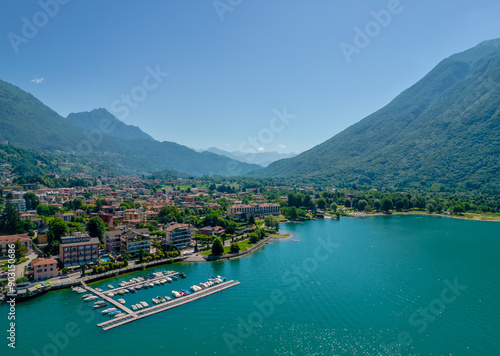 Porlezza town, Lugano Lake. Aerial panoramic photo of town in Lugano Lake between Switzerland and Lombardy, Italy photo