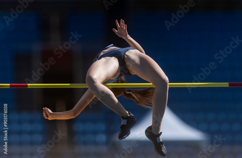 Quadro em tela Young woman in high jump