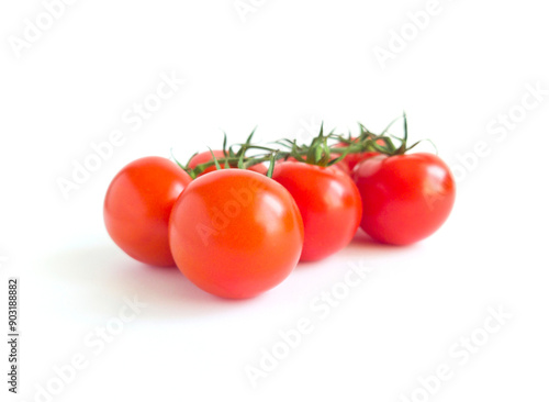 A branch of red tomatoes, Cocktail tomatoes isolated on a white background