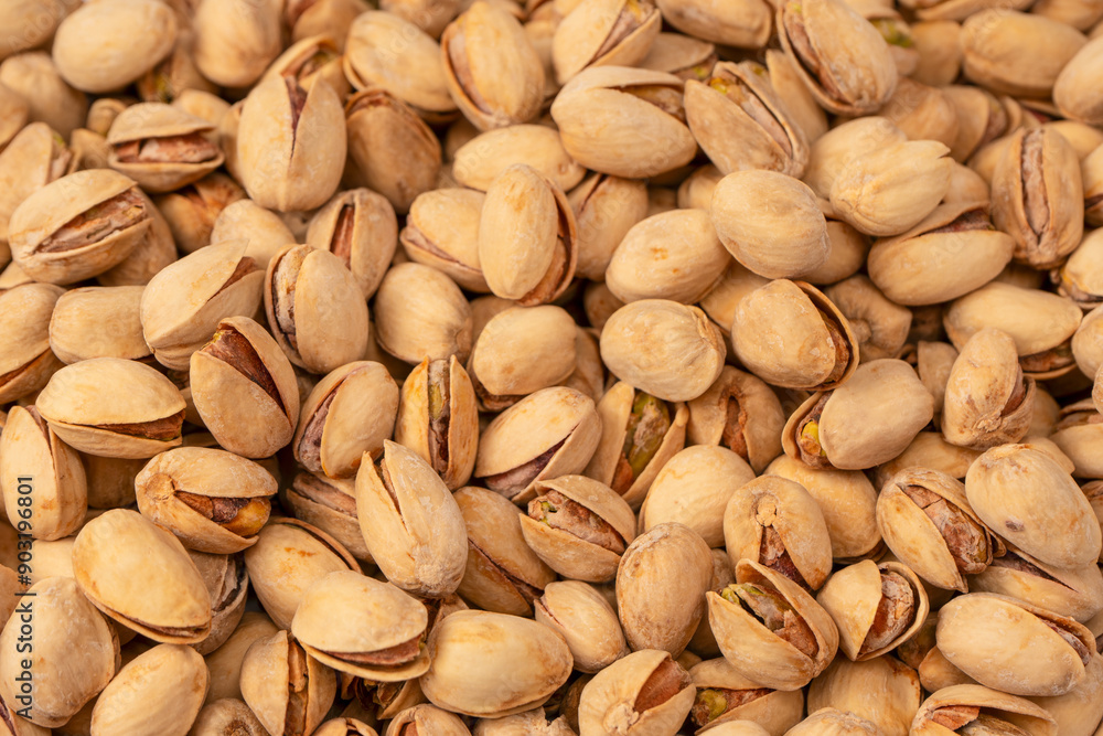 Tasty pistachios isolated on a white background. Tasty pistachios isolated on a white background.