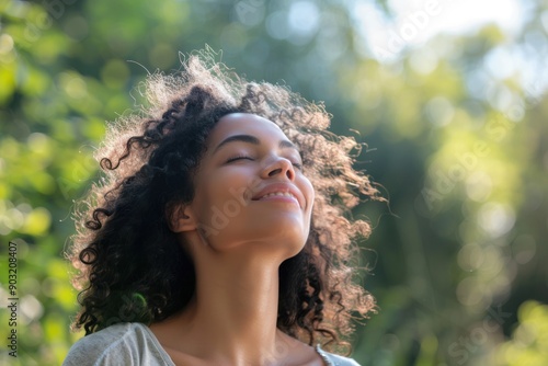 Mixed race woman relax and breathing fresh air outdoors. Portrait of young mixed race woman enjoying life